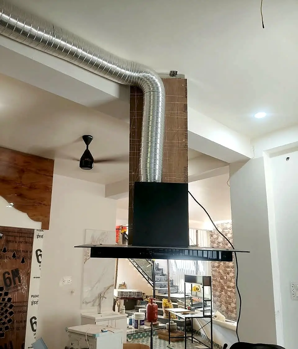 Island chimney installed by V Care in a Chennai home